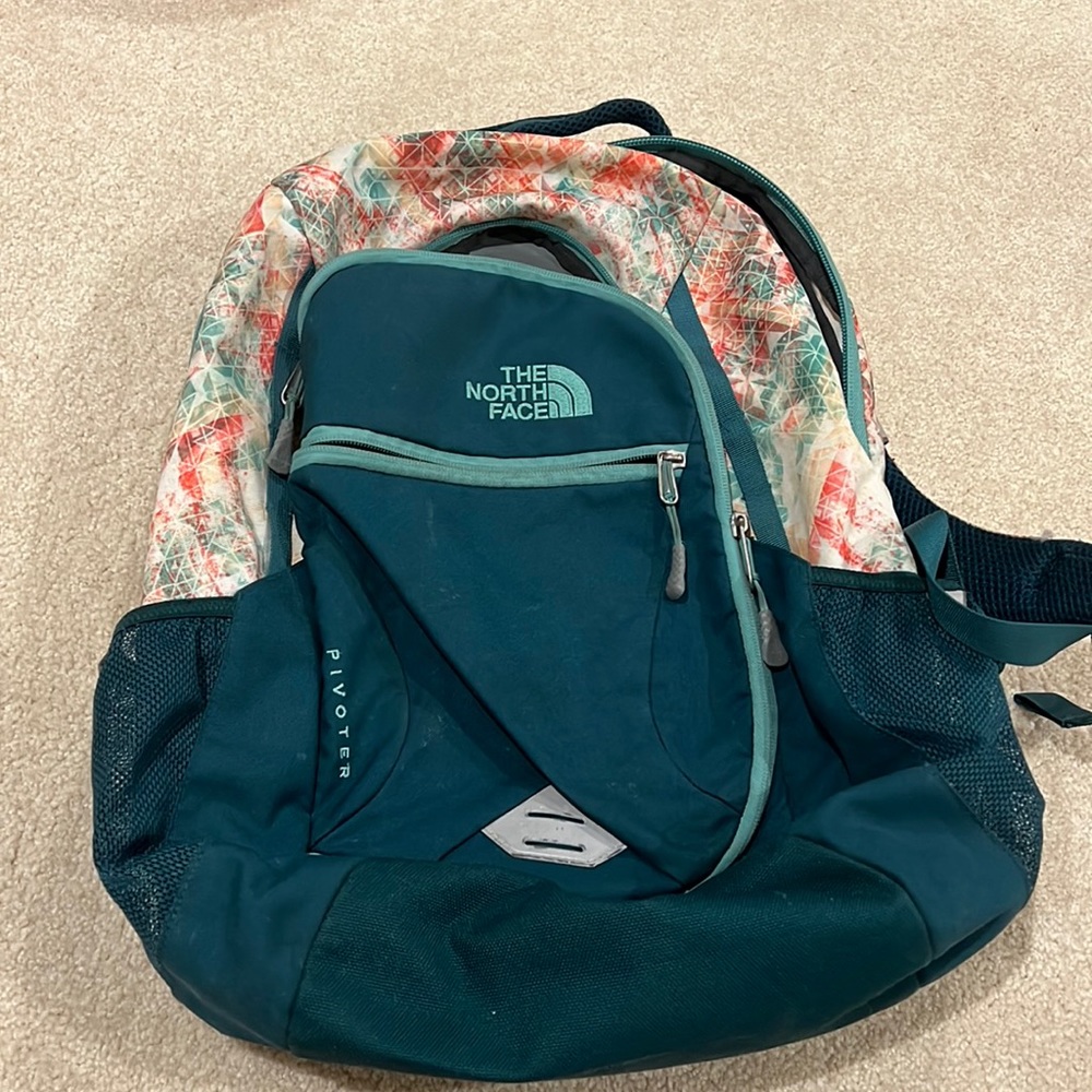 turquoise north face pivoter backpack